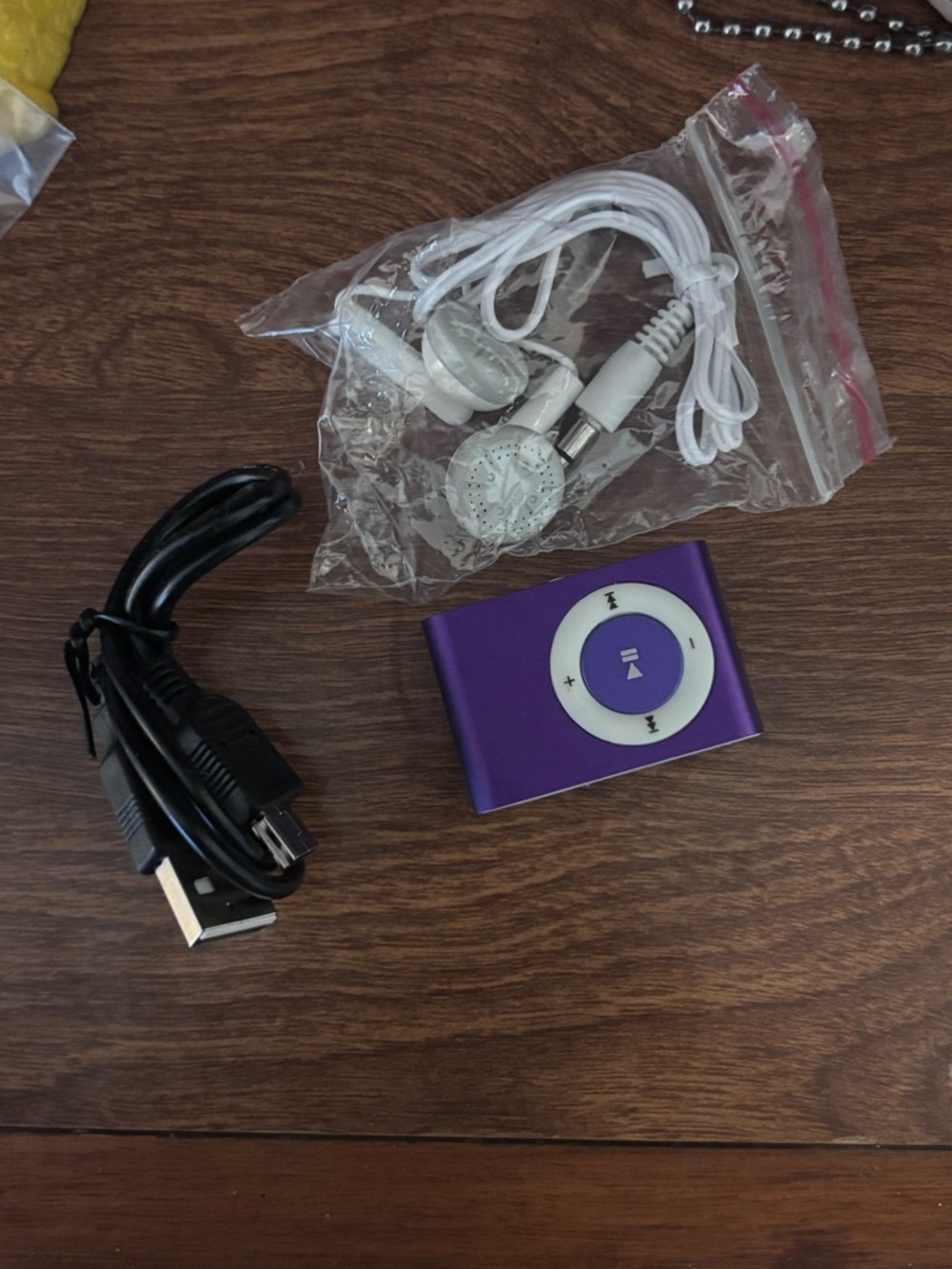 Portable Purple MP3 Player with Earbuds and USB Cable